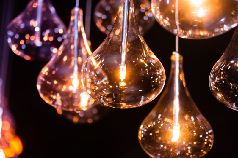 studio shot, modern, artist, illuminated, creativity, bulb, glass - material, bulbs, electric, no people, reflection, house, black background, technology