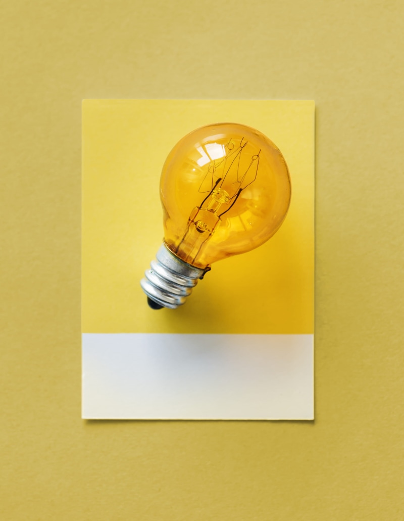 gold colored, electrical, yellow, pen, orange, no people, studio shot, innovation, yellow background, glass, still life, inspiration, object, directly above