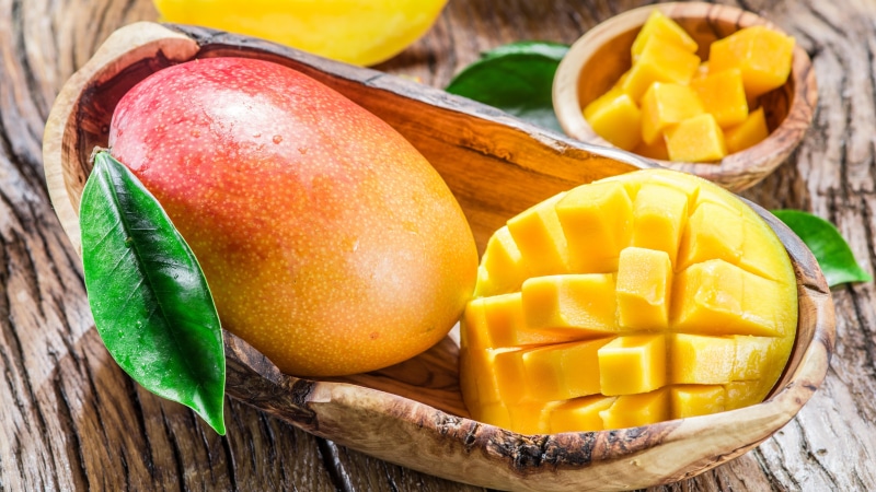 wood - material, container, no people, mango, still life, close-up, 8k, food, food and drink, leaf, fruit, basket, mango fruit, table, indoors, tropical fruit