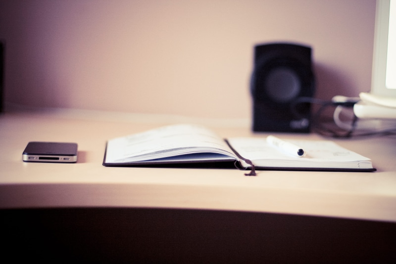 furniture, planning, electric lamp, technology, computer Keyboard, selective focus, office, focus on foreground, iPhone, connection, absence, pen, notebook