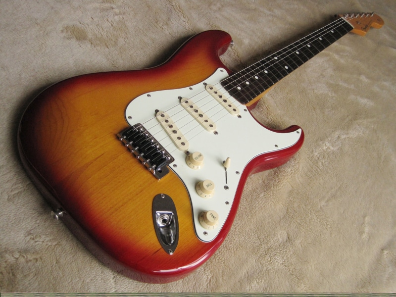 musician, brown, electric, indoors, table, strat, guitar, musical instrument string, musical equipment, 2K, no people, style, arts culture and entertainment