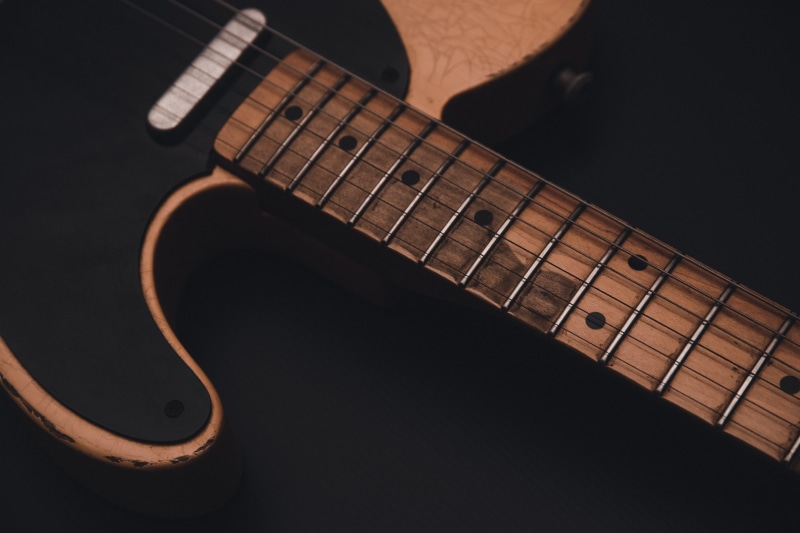 yellow, musical instrument, fretboard, brown, telecaster, pottery, close-up, interior design, string, leisure activities, mood, string instrument, wood - material