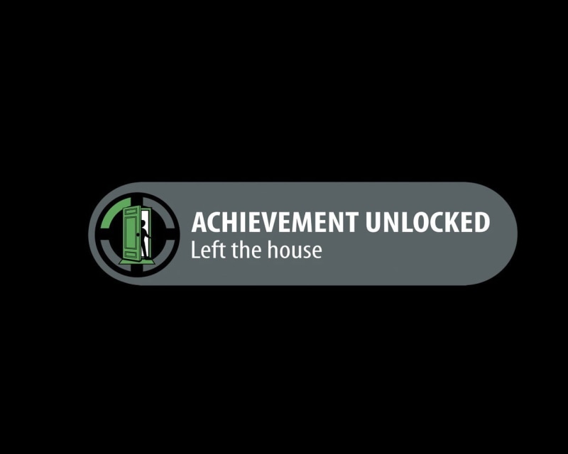 western script, 720P, control, studio shot, sign, Xbox 360, simple background, illuminated, no people, text, indoors, video games, communication, achievement