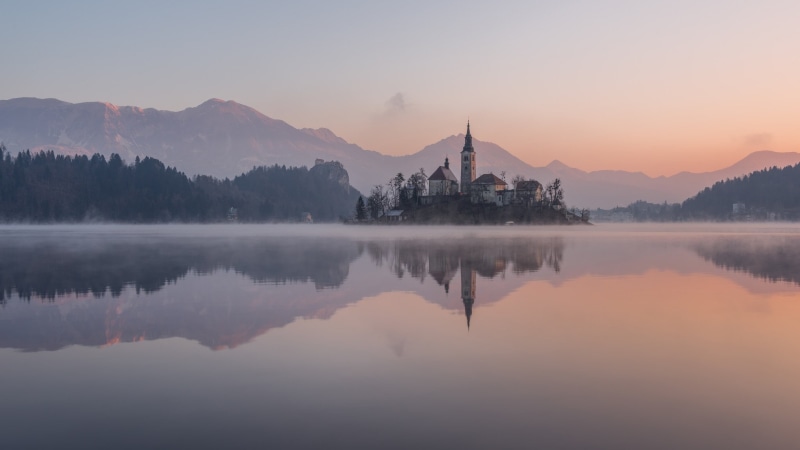 dusk, forest, architecture, island, white, pine trees, mountain range, waterfront, scenics - nature, tranquil scene, belief, water, sky, religion, dawn