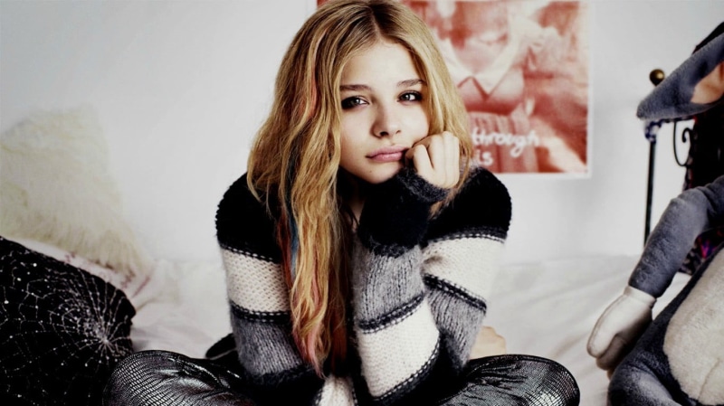one person, chloe, young women, portrait, contemplation, clothing, sitting, scarf, lifestyles, sweater, home interior, hairstyle, young adult, moretz, leisure activity