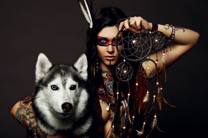 young women, one animal, Dog, Women, Dreamcatcher, looking at camera, black background, headshot, fashion, beautiful woman, Husky, one person, pets, front view