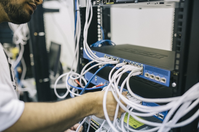 server, utp, person, computer programmer, connection, office, man, wireless technology, internet, blur, global communications, indoors, it support, technology