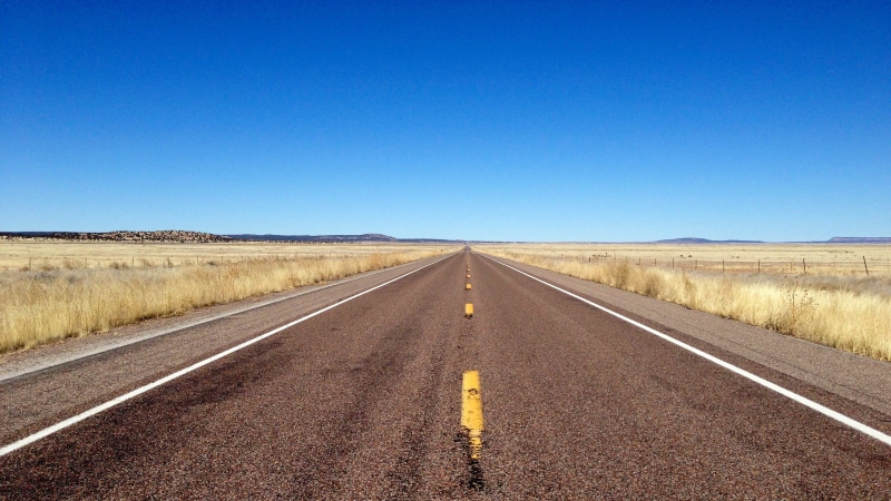 copy space, transportation, landscape, united states, road, day, marking, seligman, route 66, desert, dividing line, blue, environment, outdoors, sky, no people