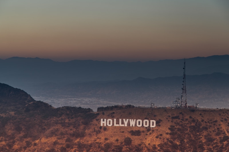 smog, los angeles, hollywood sign, dusk, built structure, western script, sign, dawn, mountain range, california, sunset, architecture, daytime, beauty in nature