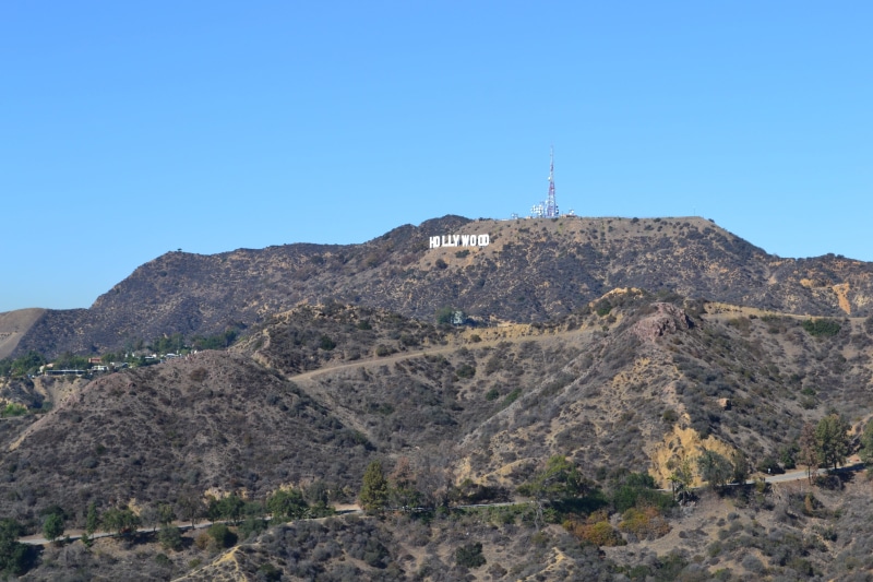 mountain range, sign, the past, building exterior, tranquil, hollywood hill, los angeles, landscape, sky, rock - object, mountain, outdoor, wilderness