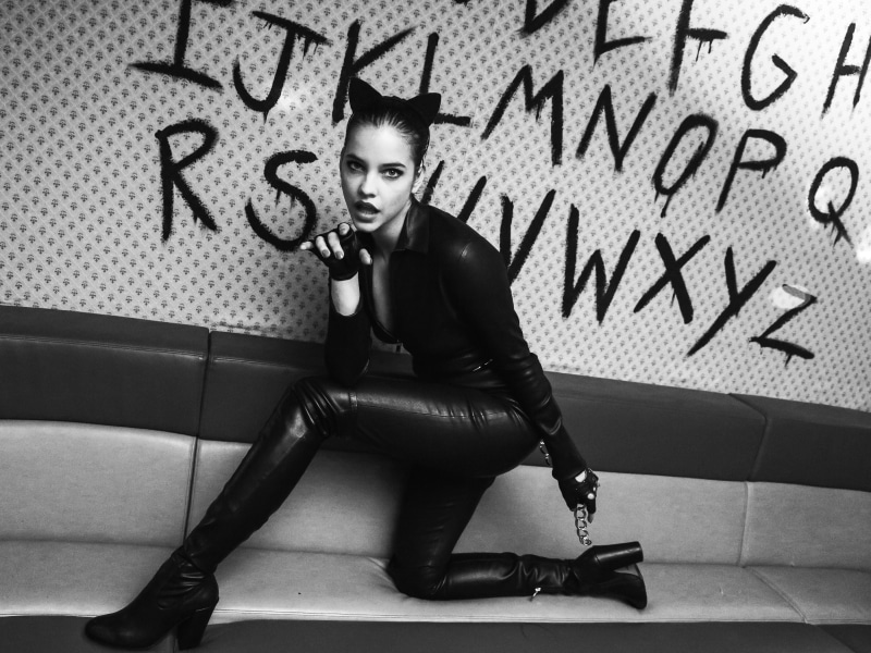 casual clothing, looking at camera, young men, young women, hairstyle, emotion, 2K, full length, glasses, lifestyles, portrait, indoors, catsuit, one person