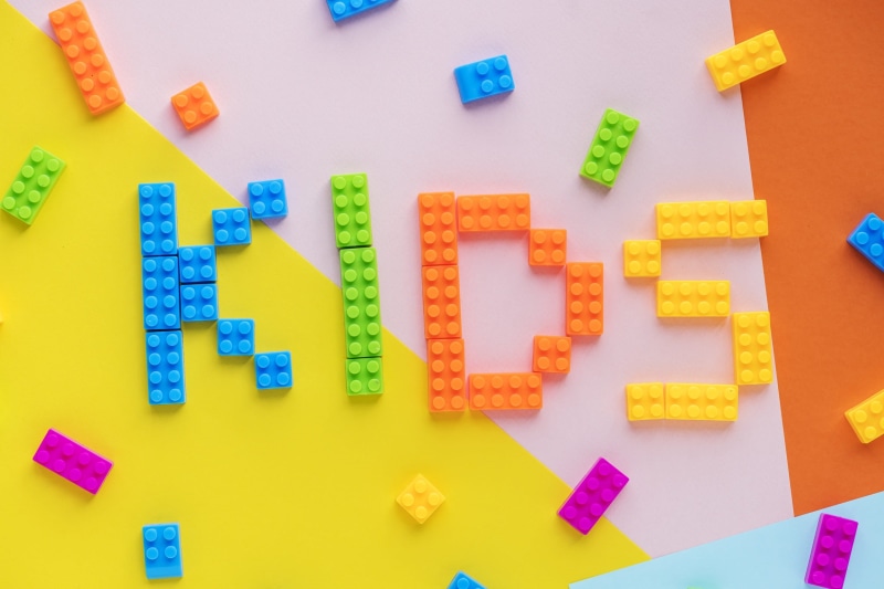  studying, colorful, block, studio shot, blocks, word, kids, playroom, school, colored background, aerial, spelling, letters, photography, character
