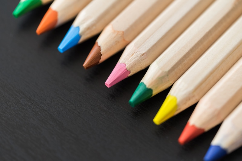 group of Objects, in a row, room for text, pencils, large group of objects, table, Desk, pencil, creative, minimalistic, kids, writing instrument, close