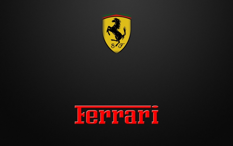 text, non-western script, information sign, red, logo, guidance, emblem, sign, capital letter, indoors, copy space, ferrari, script, message, no people