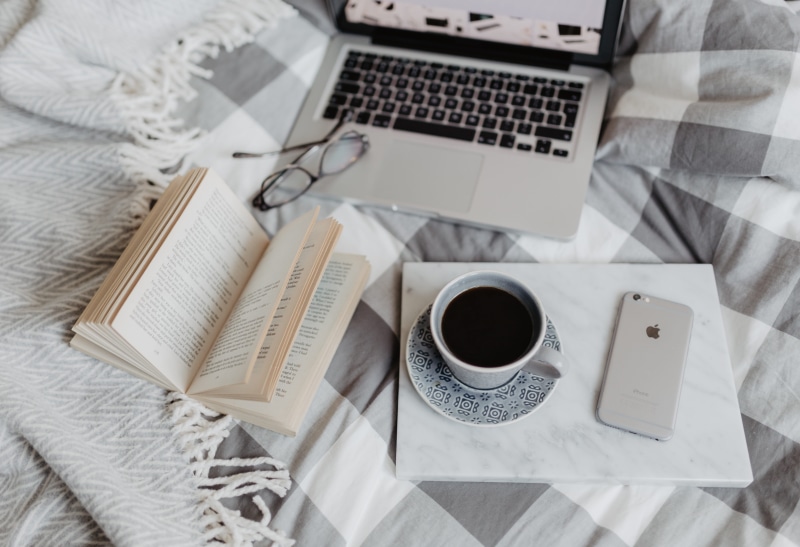 book, bedding, 5K, mug, indoors, drink, coffee - drink, blogging, iphone, cup, furniture, flatlay, wireless technology, no people, bedroom, high angle view