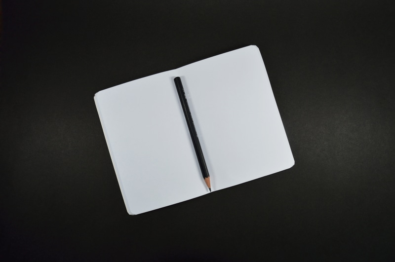 communication, isolated, empty, high angle view, printing, colored background, sketch, indoors, office, to write, black background, address book, annotation
