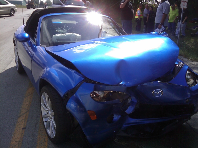 outdoors, land Vehicle, engine, drunk, bumper, broken, crash, auto, daytime, day, mode of transportation, smashed, sunlight, road, headlight, incidental people