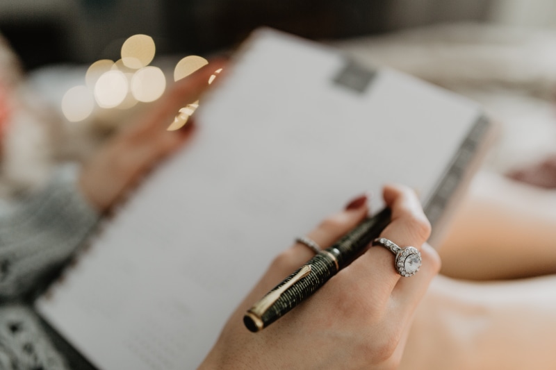 notebook, close-up, selective focus, female, lying, work, copy space, pen, human body part, workspace, holding, coffee, gingerbreads, planning, hand, jewelry