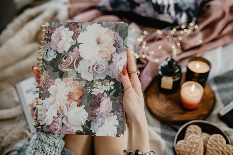 hand, candles, cosy, young adult, workspace, bed, newlywed, girl, calendar, midsection, planning, cozy, writing, couple - relationship, young women, floral pattern