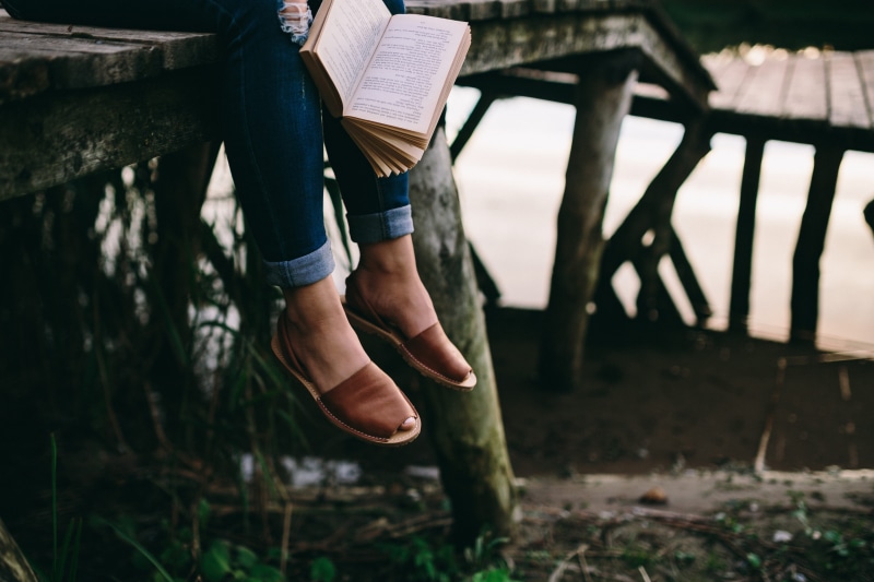 holding, one Person, lake, human leg, jeans, relaxing, human body part, seat, land, real people, 4K, man with book, nature, outdoors, one man only, low section