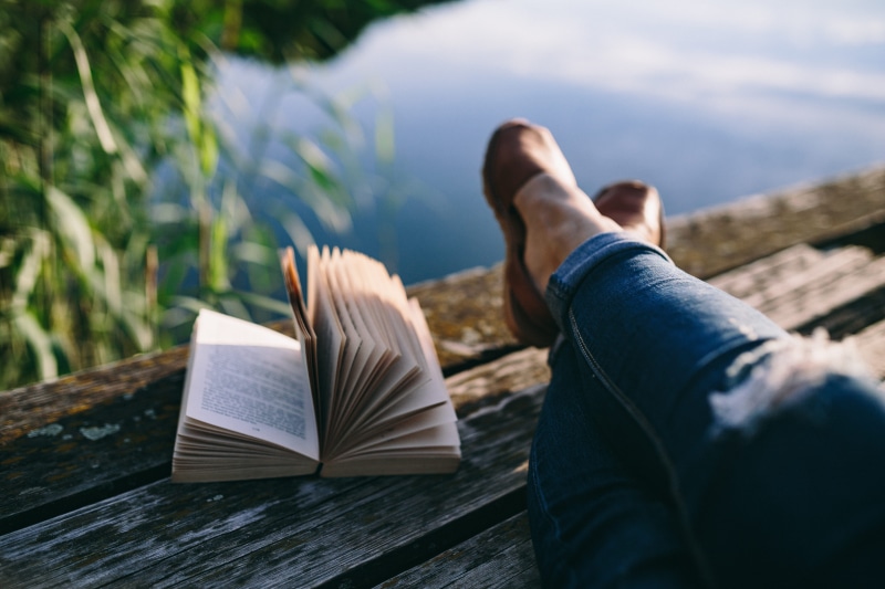 girl reading book, selective focus, jeans, wooden pier, human foot, time, opened notebook, reading, human leg, education, people, nature, woman with book