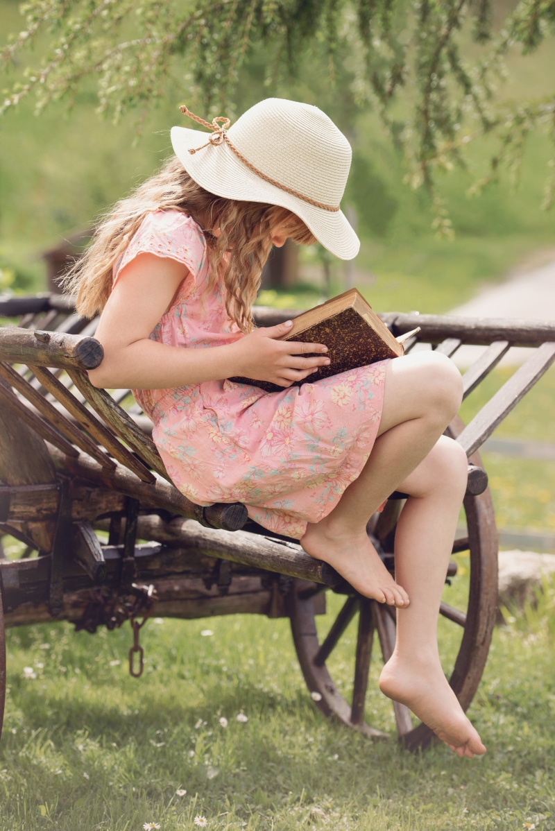 grass, hat, women, seat, 5K, females, adult, brown, day, out, real people, book, plant, hairstyle, one Person, read, human, pink, casual clothing, girl
