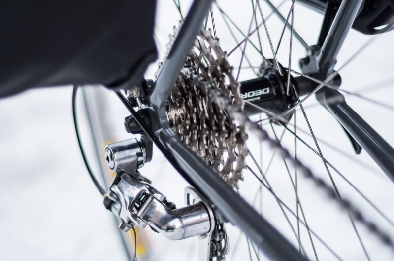 day, bicycle, photography, spokes, speed, metal, bike gear, no people, spoke, outdoors, close-up, transportation, tire, part, cycle, chain, sport, selective focus