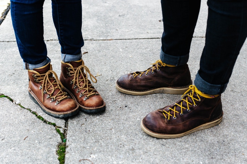 photography, city, human body part, low section, danner, footwear, shoe, footpath, fashion, standing, pair, two, boots, shoe lace, wearing, lifestyle, human leg