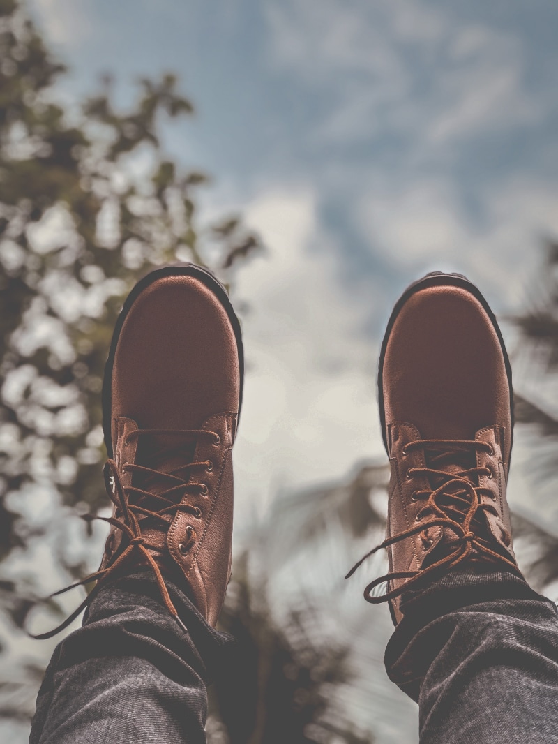 day, leather, wearing, human limb, human leg, one person, shoe, nature, leather boots, human foot, personal perspective, lifestyles, footwear, laces, 4K