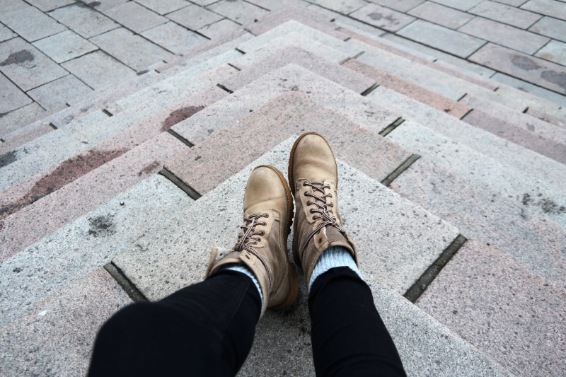 path, lifestyles, running shoe, shoe, street, leisure activity, standing, clothing, apparel, brown, 5K, undershirt, sneaker, one person, boot, personal perspective