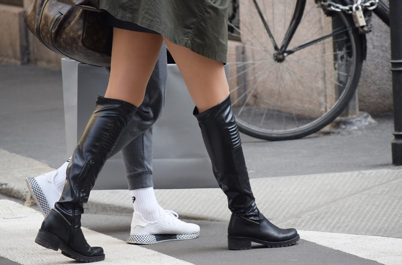casual clothing, bicycle, wearing, unique, apparel, body part, fashion, walking, real people, footpath, shoe, adult, low section, powerful, leather, leisure activity
