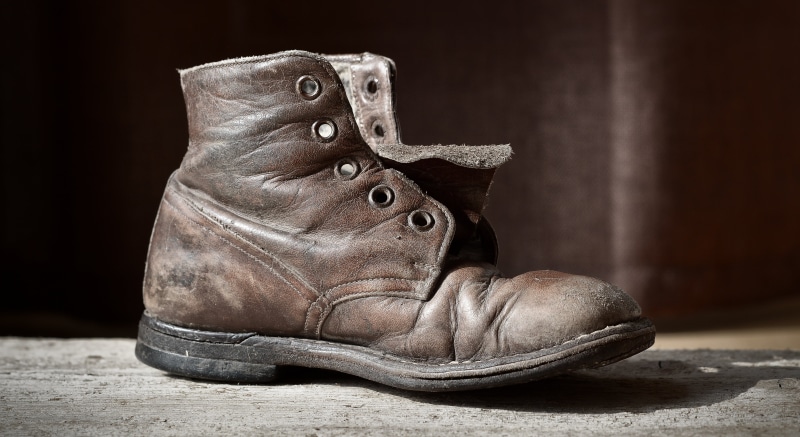no people, unpaired, close, grey, brown, fashion, worn, wood - Material, indoors, pair, sport, black background, studio shot, leather, close-up, leather shoe