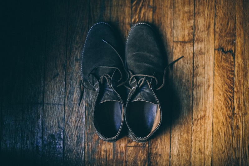 floor, pair, no people, indoors, dark, two objects, brown, shoe, leather, wood - material, chukka, hardwood floor, shoe lace, flooring, personal accessory