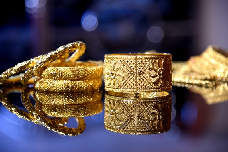gold, bangle, bracelet, marriage, indoors, ornate, finance, jewelry, elegance, no people, silver colored, shiny, food and drink, necklace, ring, golden