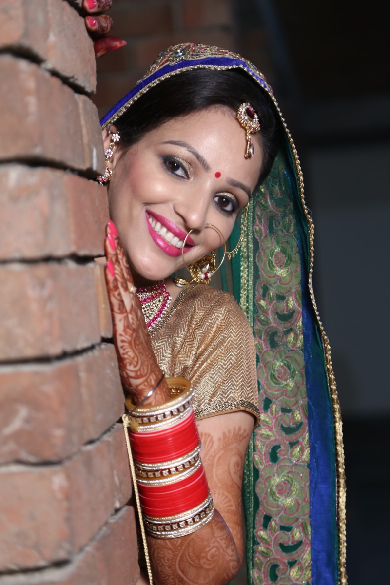 clothing, marriage, happiness, smiling, indian, real people, lifestyles, front view, traditional clothing, young women, one person, sari, beautiful woman