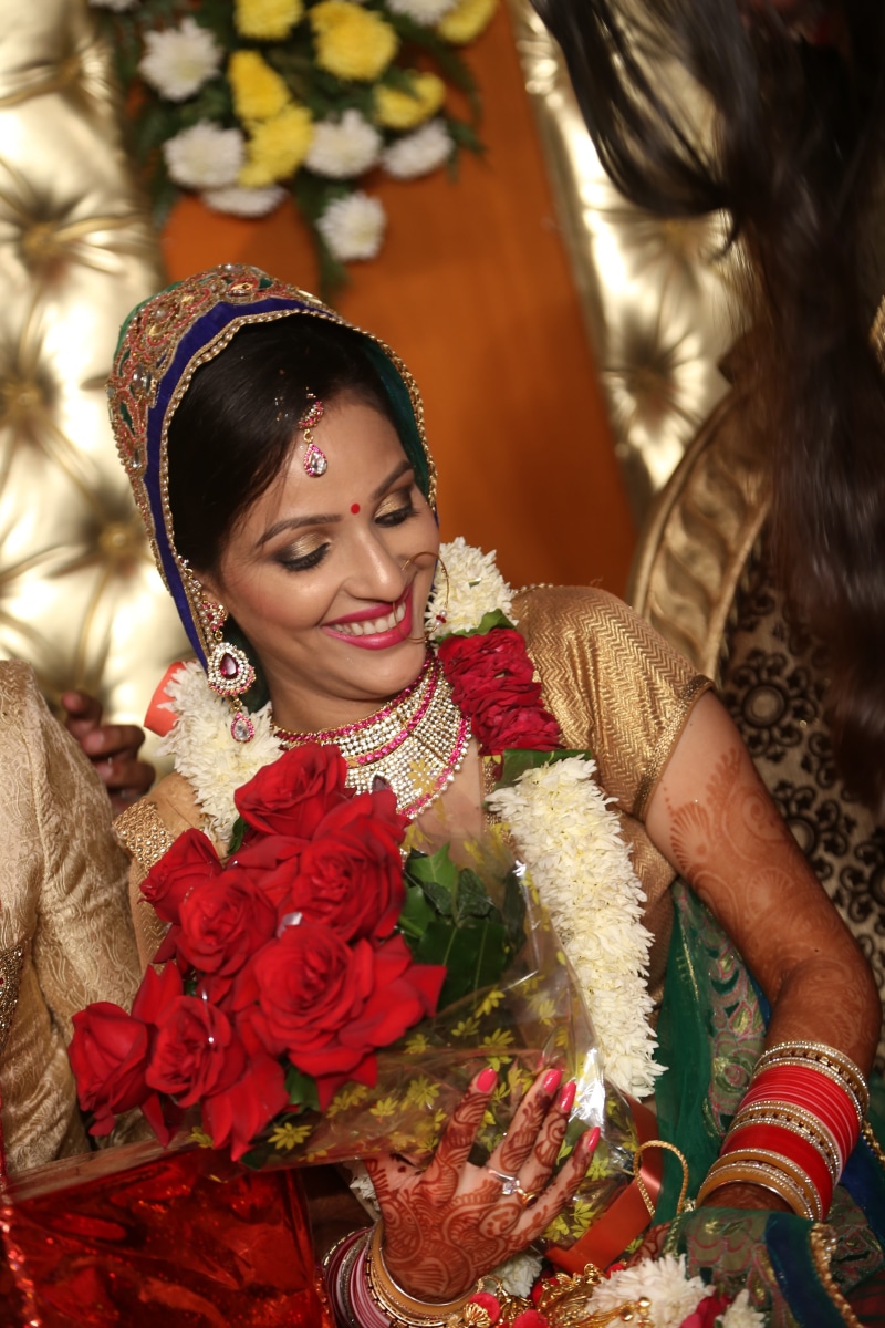 happiness, emotion, beautiful woman, flower, plant, smiling, bouquet, portrait, front view, traditional clothing, clothing, real people, bride, women, looking at camera