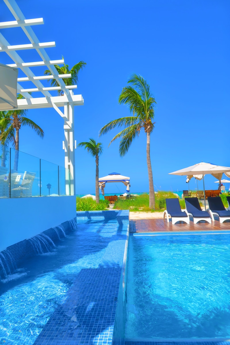 swimming, plant, chair, oceans, tropical climate, weddings, swimming pool, tropical, swim, no people, tourist resort, beach home, clear sky, water, pool