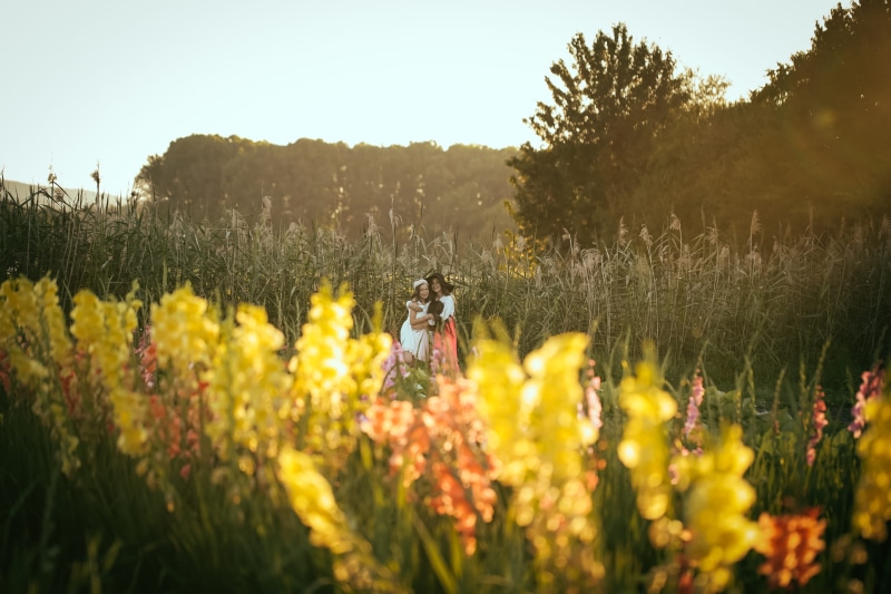 daytime, day, flowers, flowering plant, green, outdoors, tree, three, outdoor, friendship, land, tranquility, real people, lavender, girl, grasses, friends