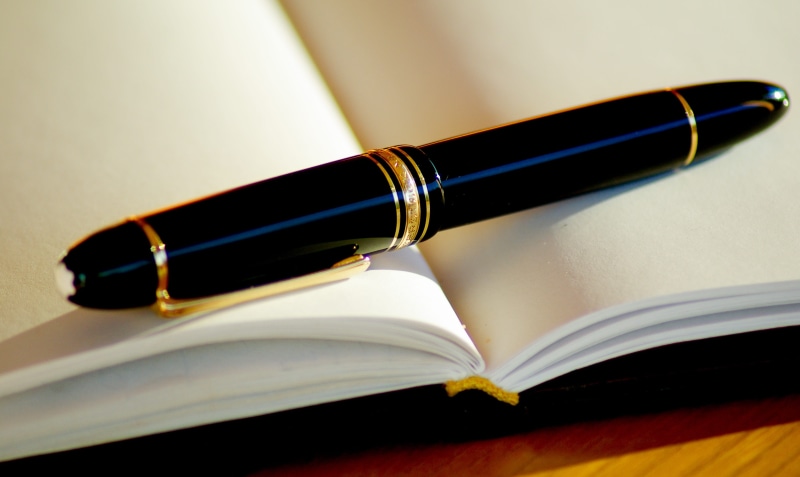 ballpoint pen, education, hardcover book, note pad, learning, publication, opened, no people, indoors, writing instrument, paper, document, ink, message