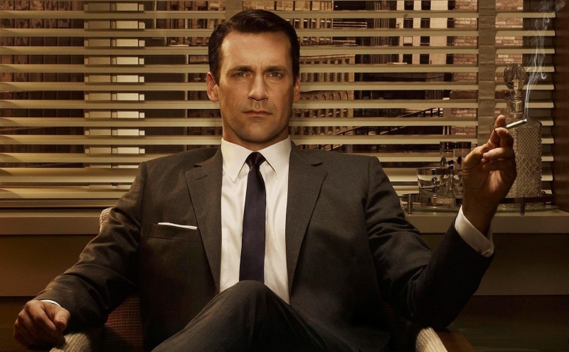 office, adult, front view, corporate business, sitting, males, Don Draper, suit, mid adult men, business, one person, well-dressed, men, looking at camera