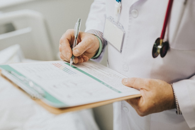 stethoscope, pen, health record, report, noting, medical record, paperwork, doctor, clinician, occupation, medical practitioner, midsection, man, medic