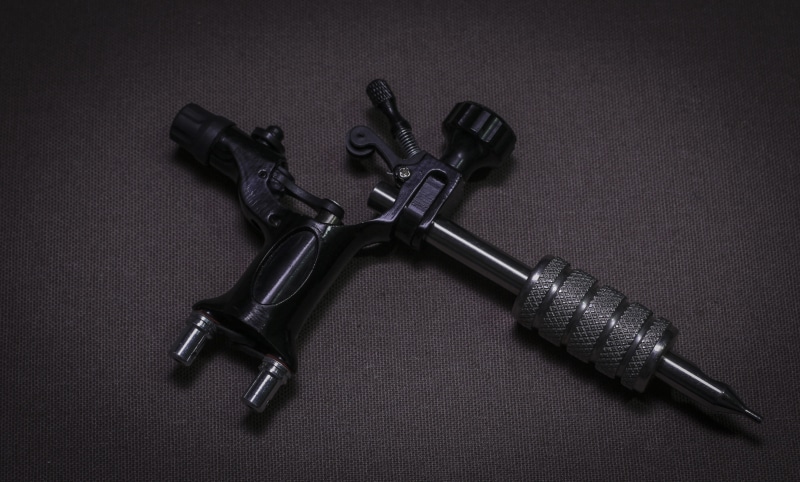 needle, gun, alternative, black, table, weapon, high angle view, studio, tool, professional, indoors, accessories for tattoos, machine, adults, machine tattoo