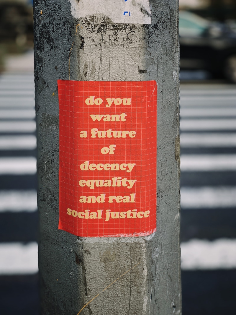 text, word, building, justice, way, message, wood - material, pole, dome, pedestrian, information, zebra crossing, red, want, decor, label, capital letter
