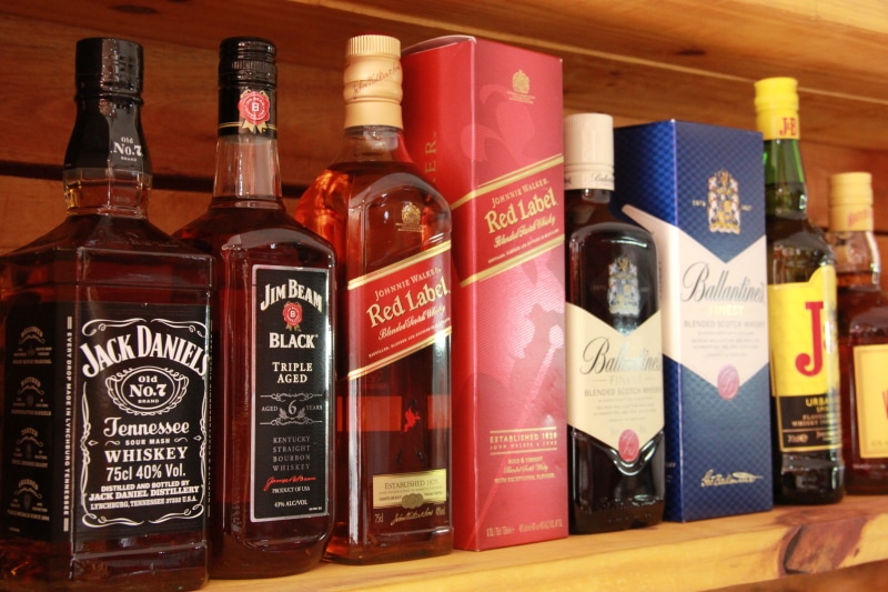 bar, variation, choice, container, bottles, drink, drinks, group of objects, whiskey, imported, food and drink, whiskies, restaurant, indoors, whiskey imported