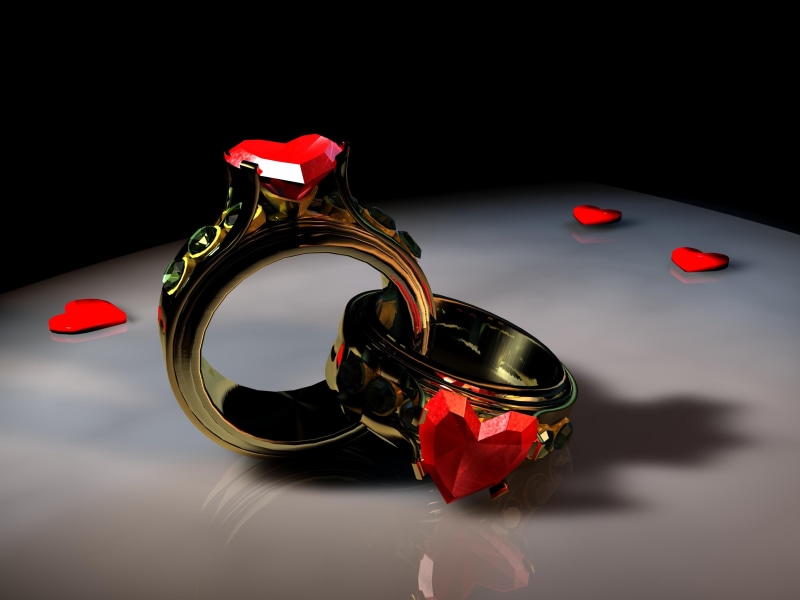 symbol, heart ring, close-up, photo, colored, nature, red, paper, flower, studio shot, black background, engagement, reflection, single object, still life