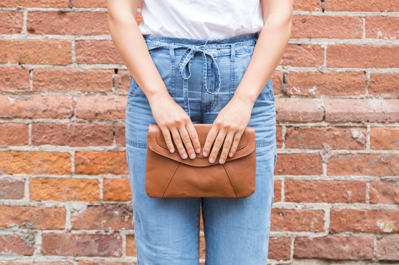 photo, casual clothing, holding, wall, Women, human hand, adult, textile, teenager, jeans, Wallet, hand, lifestyles, Hands, one person, midsection, standing