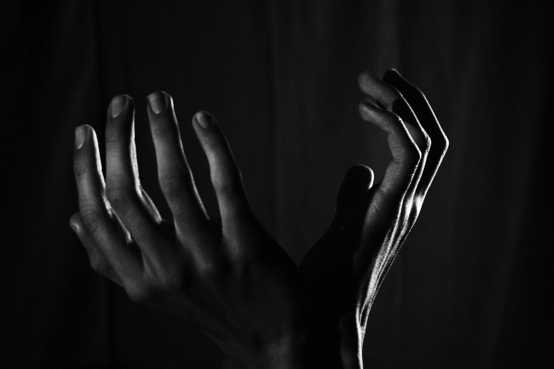 hands, human limb, black background, studio shot, real people, holding, human Hand, support, person, one person, help, open, ask, unrecognizable person