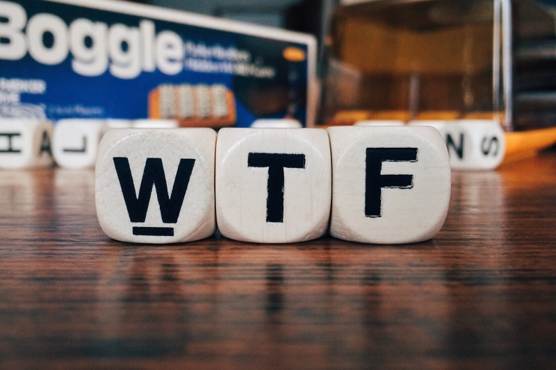 text, wtf, surface, word, no people, wood - material, indoors, arrangement, white color, focus on foreground, boggle, choice, group of objects, day, still life