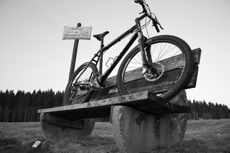 wheel, text, sign, field, clear sky, day, 4K, land, sky, landscape, bicycle, bike, nature, grayscale, transportation, monochrome, no people, rural scene