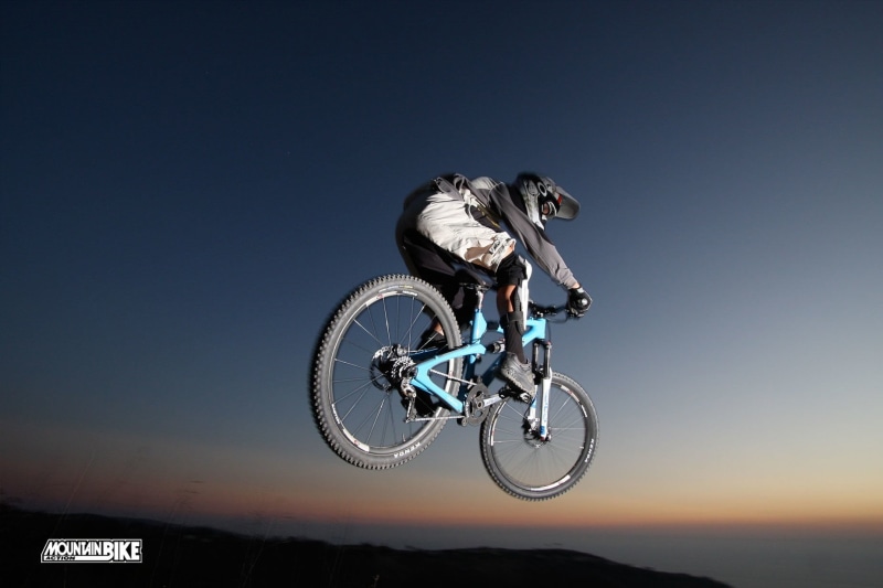clear sky, nature, activity, low angle view, one person, Bicycle, skill, white, suspension, mid-air, extreme sports, riding, headwear, leisure activity